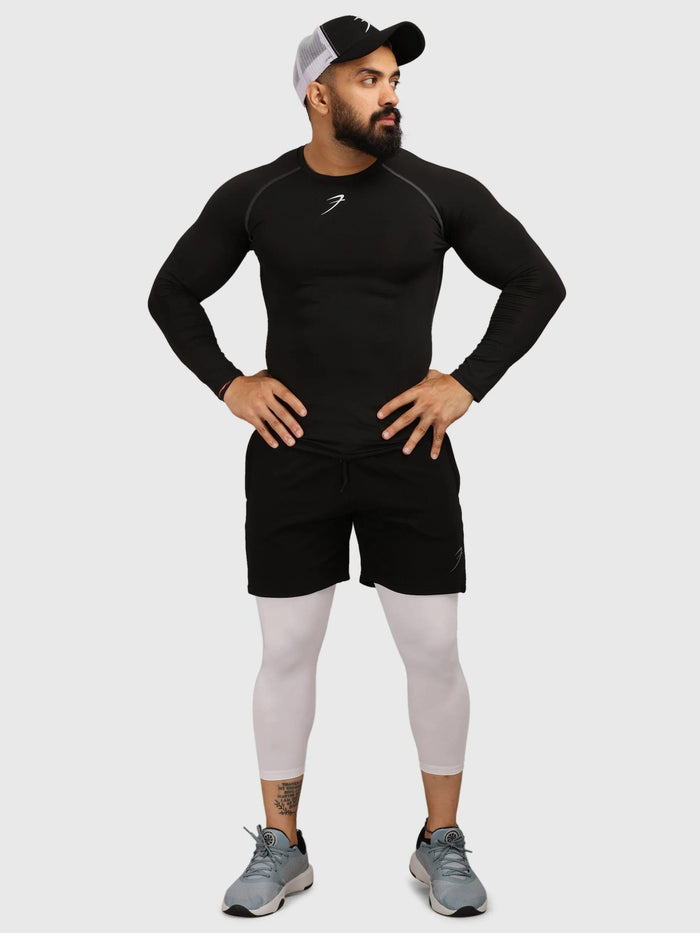 Black Fuaark Nz compression fullsleeves T-shirt, close-up of sleek, fitted athletic T-shirt with long sleeves and branding details