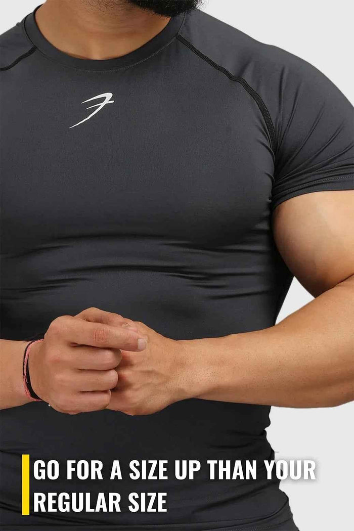 Fuaark Nz grey compression T-shirt for men, made from breathable fabric, designed for athletic and casual wear.