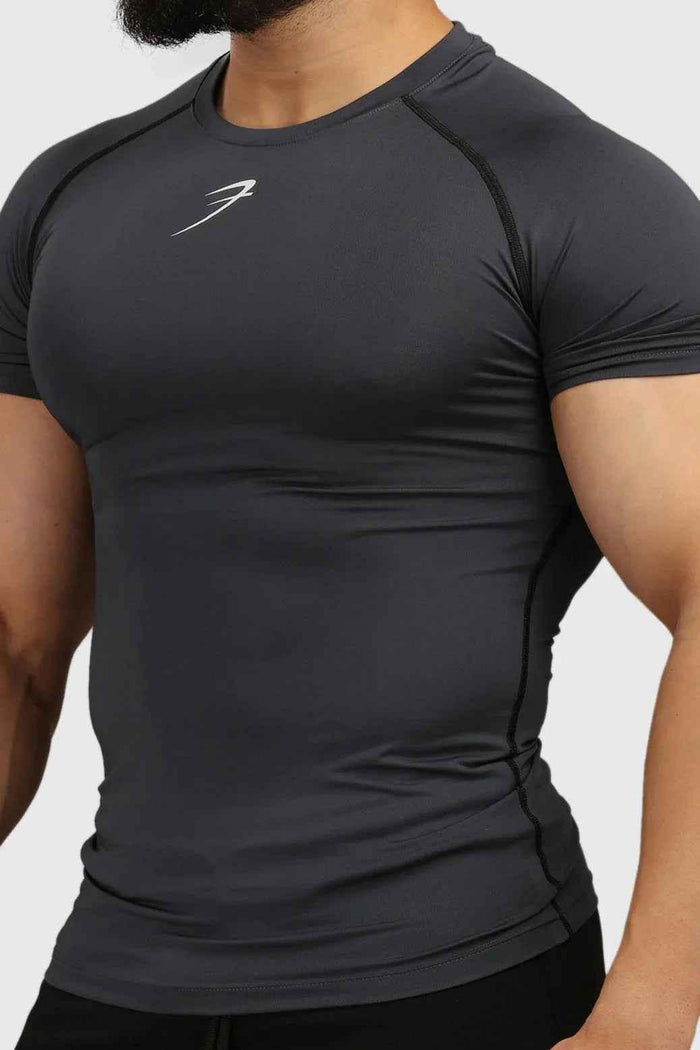 Fuaark Nz grey compression T-shirt for men, made from breathable fabric, designed for athletic performance and comfort.
