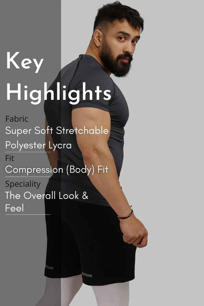 Grey compression T-shirt by Fuaark Nz, close-up view showing fitted, stretchy fabric and breathable design for athletic wear.