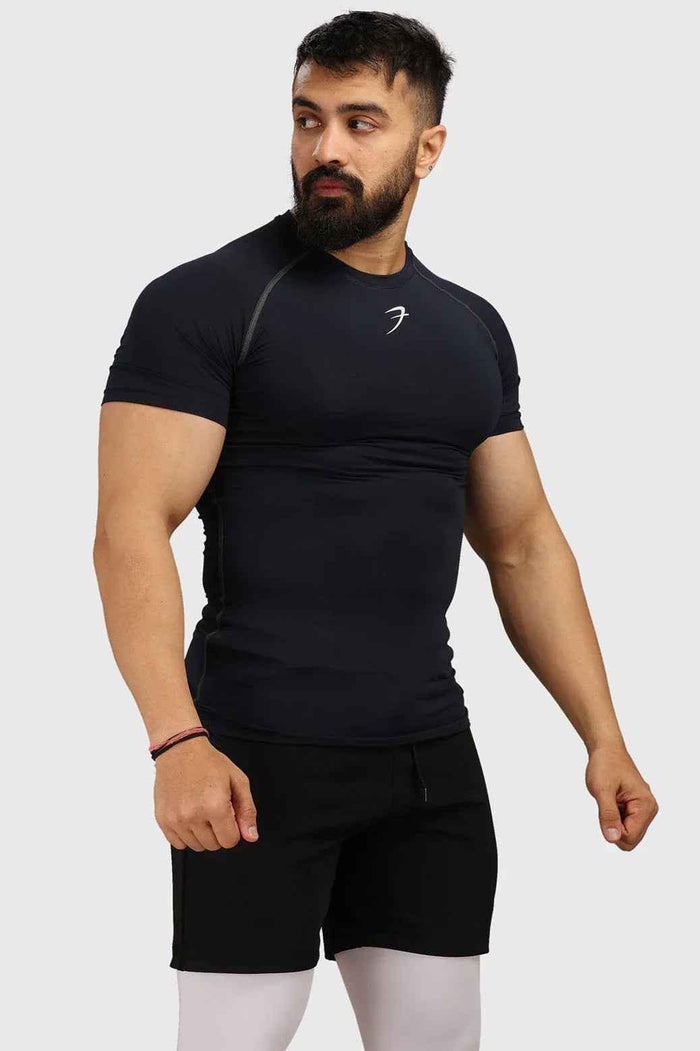 Navy compression T-shirt from Fuaark Nz, made of stretchy fabric, designed for athletic performance and comfort.
