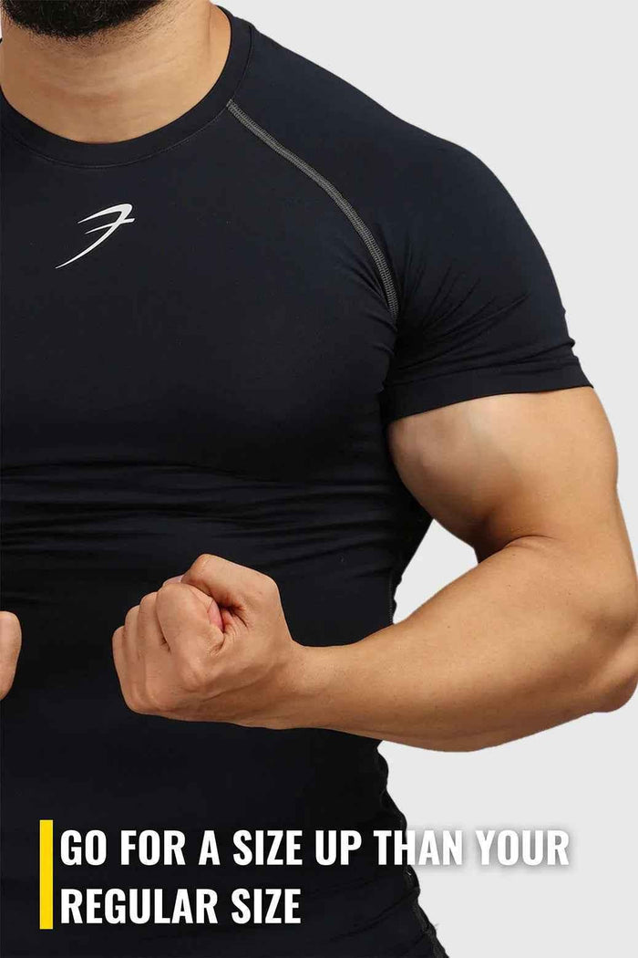 Navy compression T-shirt by Fuaark Nz, fitted athletic T-shirt with moisture-wicking fabric and crew neck design.