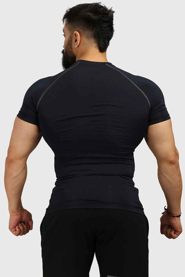 Navy compression T-shirt by Fuaark Nz, designed for athletic fit and support, shown on a mannequin.