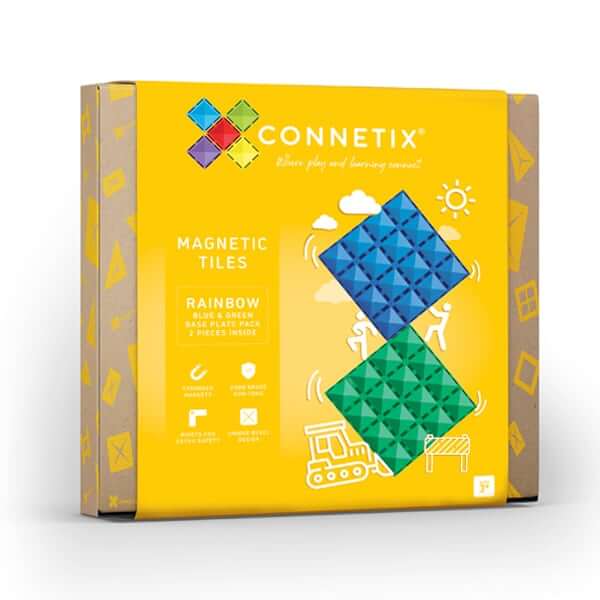 Yellow packaging for magnetic tiles showing large blue and green square base plates and playful illustrations.