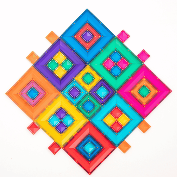 Symmetrical diamond pattern of colorful translucent magnetic tiles with nested square designs on a white background.