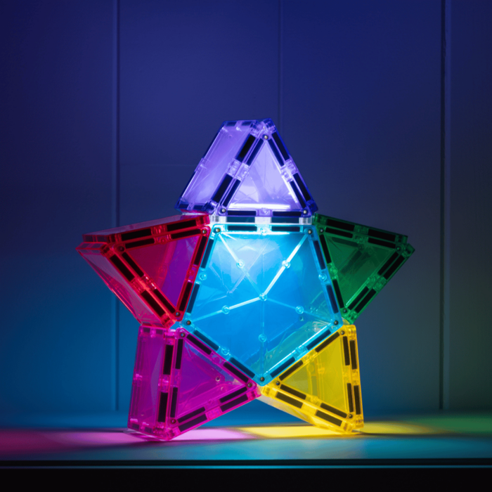 Glowing 3D star made of pink, purple, blue, green, and yellow translucent magnetic tiles.