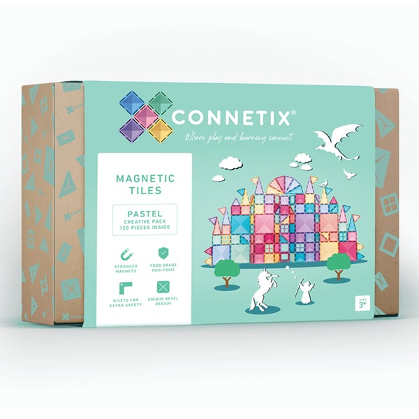 Mint green box showing a pastel magnetic tile castle build with unicorn, dragon, and wizard illustrations.