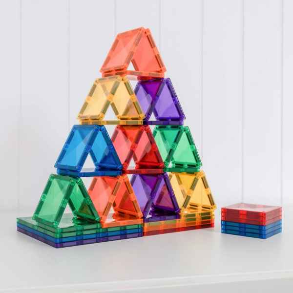 Rainbow-colored translucent magnetic square tiles built into a tall pyramid tower.