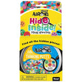 Clear thinking putty with colorful emoji charms inside yellow packaging with a magnifying glass graphic.