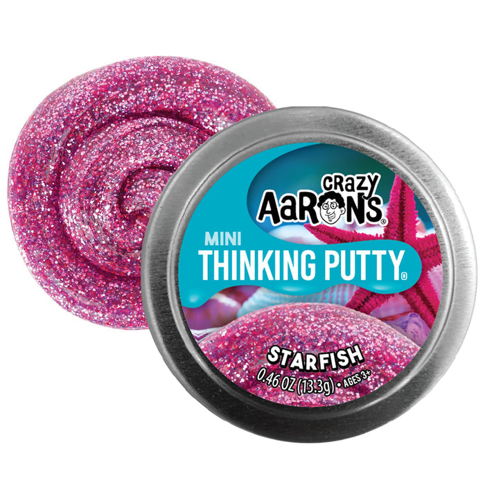 Sparkly pink glitter putty swirled behind a silver mini tin with a pink starfish design on the lid.