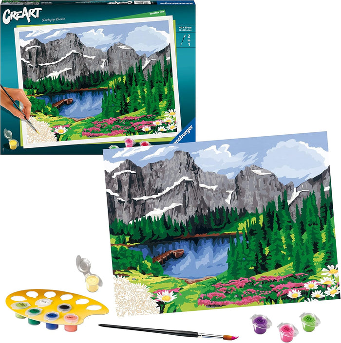 Mountain lake paint-by-numbers kit featuring box, canvas, colorful paint pots in a palette, and two brushes.