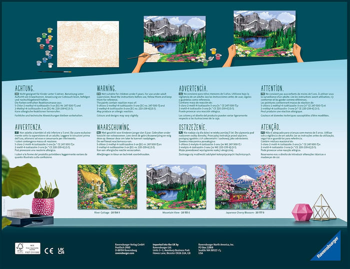 Back of a Ravensburger CreArt box with three landscape art designs, multilingual warnings, and product information.