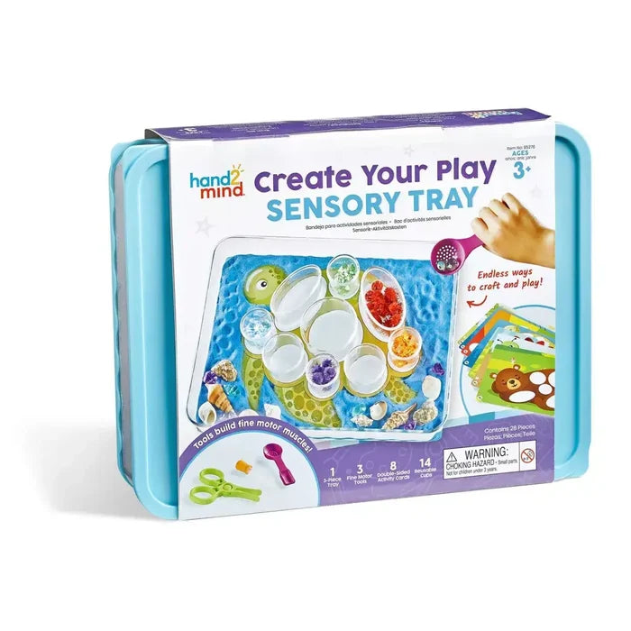 Light blue sensory bin with a white sleeve showing a beach play scene, toy scoop, tongs, and activity cards.