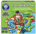Green Crocodile Snap box by Orchard Toys featuring a cartoon crocodile, monkey, toucan, and blue snake in a sun hat.