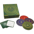 Cryptic Christmas holiday word game including a green square box, circular cipher wheels, and square game cards.