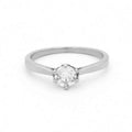 Silver stainless steel wedding engagement ring with cubic zirconia stones, featuring a sleek and elegant design by Glitters.