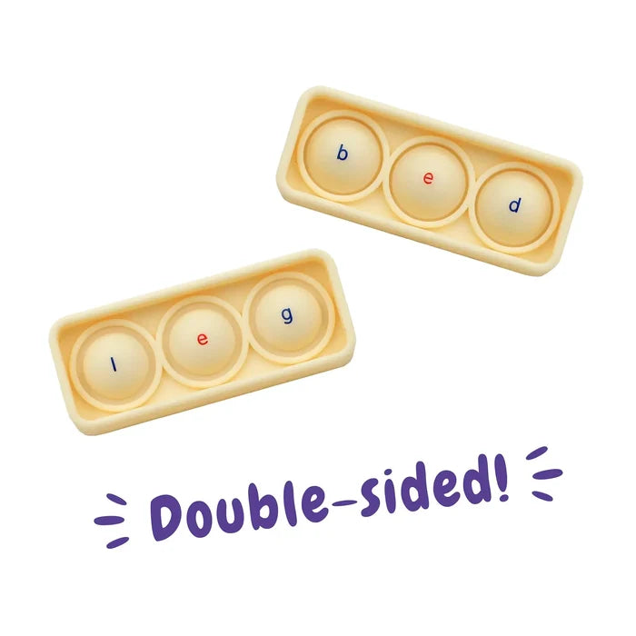 Two cream trays with three pop bubbles spelling bed and leg in blue and red. Purple text says Double-sided!