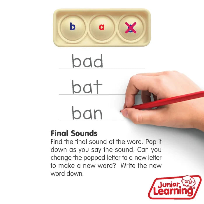 Cream-colored 3-bubble pop board with letters b and a. A hand writes bad, bat, and ban below on lined paper.