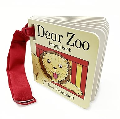 Small board book featuring a lion on the cover and a red fabric Velcro strap for attaching to a buggy.