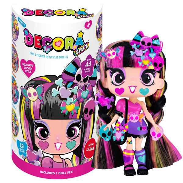 Fashion doll with pink and black pigtails, skull and heart stickers, next to a colorful cylindrical package.