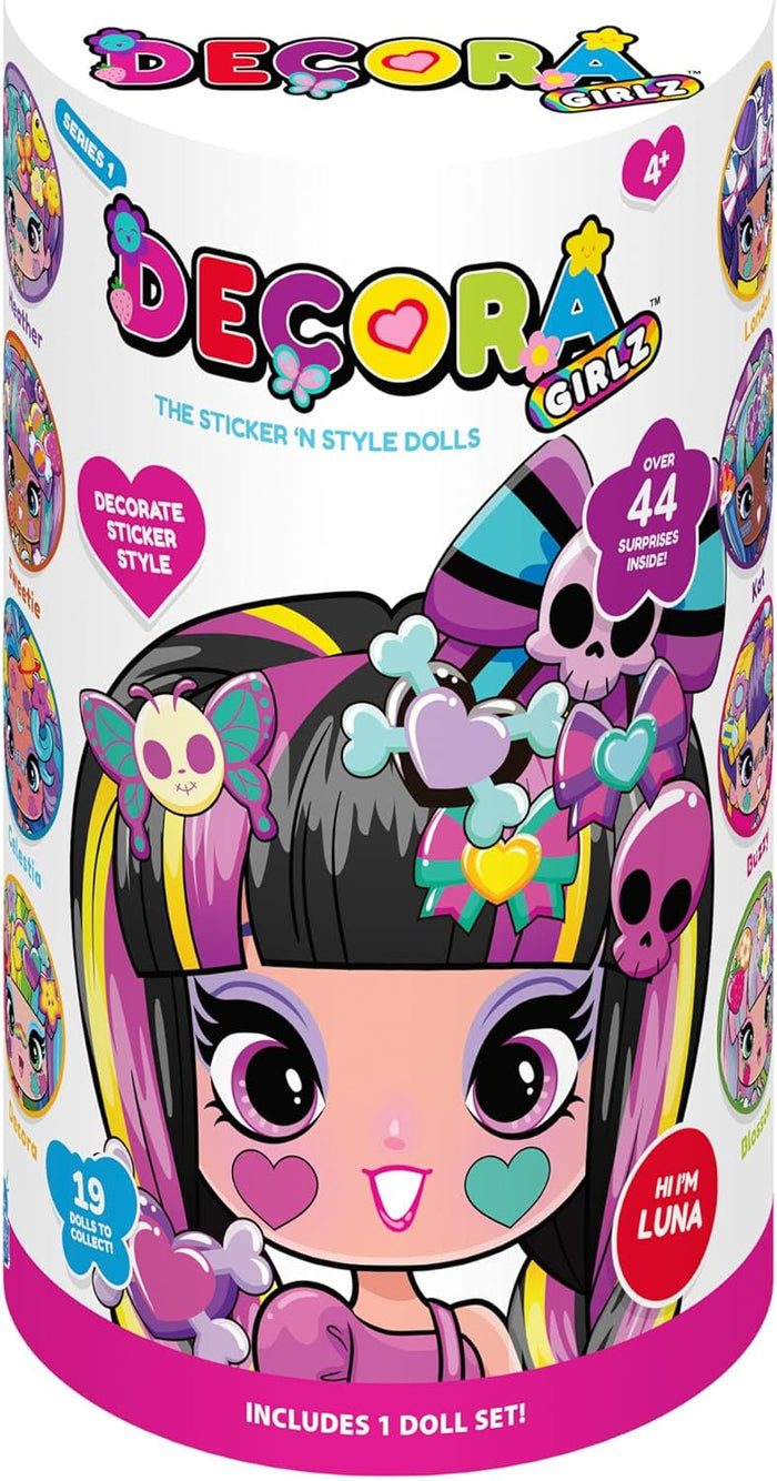 Cylindrical pink toy package featuring Luna, a doll with black hair, heart face stickers, and colorful skull accessories.