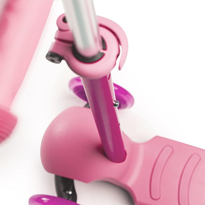 Detailed view of a pink scooter's adjustable handlebar pole, height adjustment pin, and purple front wheels.