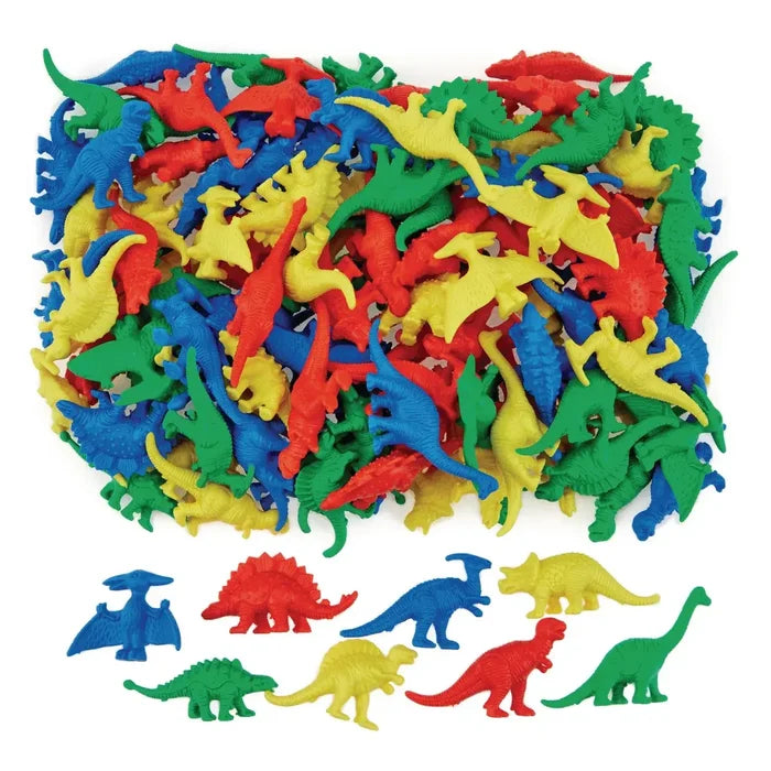 Colorful red, blue, green, and yellow plastic dinosaur counters in various prehistoric shapes and species.