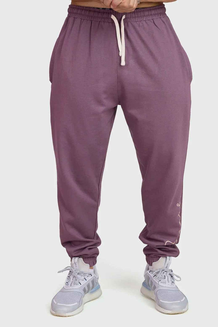 Fuaark Nz mauve oversized joggers featuring a relaxed fit, soft fabric, and stylish design for ultimate comfort and casual wear.