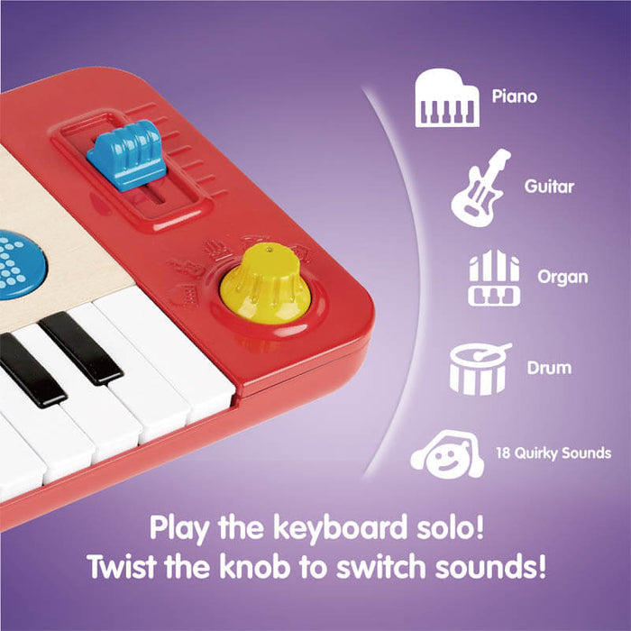 Red toy keyboard featuring a blue slider, yellow knob, and icons for piano, guitar, organ, and drum sounds.