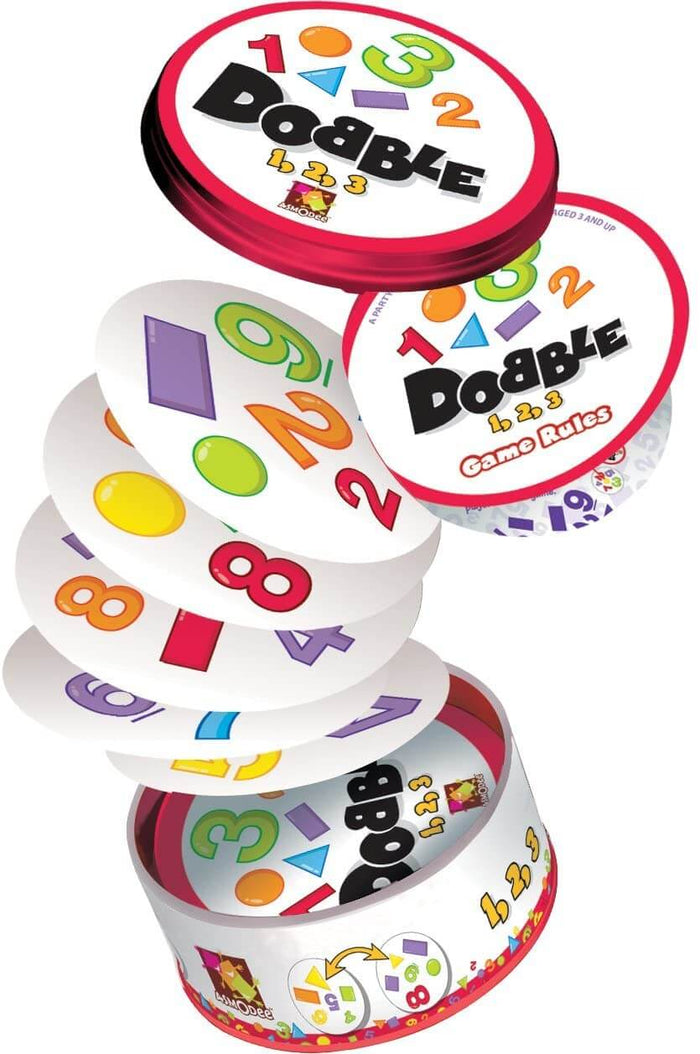 Round red metal tin with circular cards fanning out, featuring colorful numbers and geometric shapes.