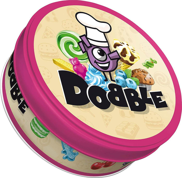 Round pink and cream metal tin with a purple cartoon character in a chef hat, cupcakes, fruit, and candy icons.