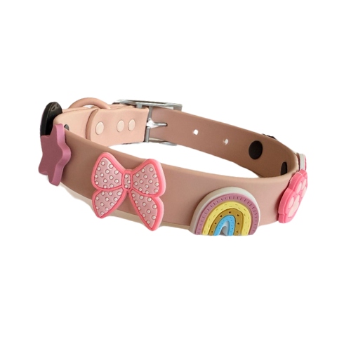 Blush pink waterproof dog collar by Walkieez, durable and adjustable, shown on a friendly dog.