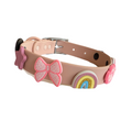 Blush pink waterproof dog collar by Walkieez, durable and adjustable, shown on a friendly dog.