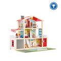Three-story wooden dollhouse with red roof, furnished rooms, figures, rolling garage door, and garden play mat.