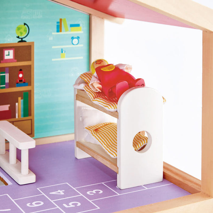 Dollhouse room featuring a wooden doll in a bunk bed, yellow striped bedding, and a purple hopscotch floor.