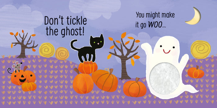 Illustration of a black cat, pumpkins, and a white ghost with a soft, fuzzy touch-and-feel belly on a purple field.