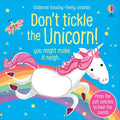 Bright blue book cover with a white unicorn and pink mane jumping over a rainbow, featuring a touch-and-feel patch.