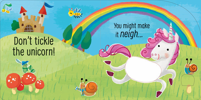 Colorful children's book page featuring a white unicorn, pink mane, rainbow, castle, and a touch-and-feel patch.