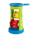 Colorful plastic toy with a top blue funnel, green frame, yellow and red spinning wheels, and a blue sifting base.