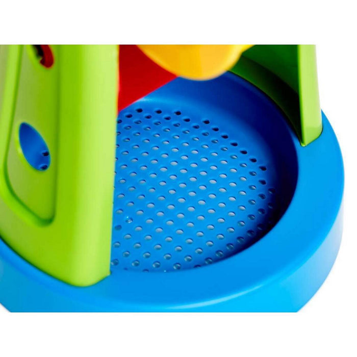 Close-up of a blue perforated basin with lime green side panels and a yellow top funnel on a colorful toy.