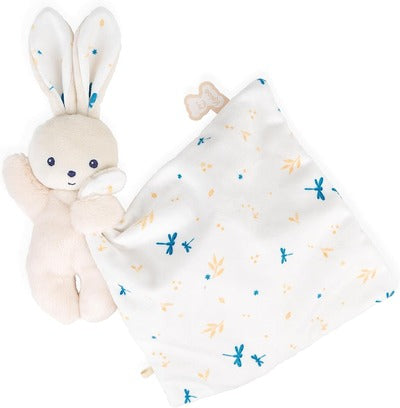 Plush cream rabbit attached to a white square blanket featuring blue dragonfly and gold leaf designs.