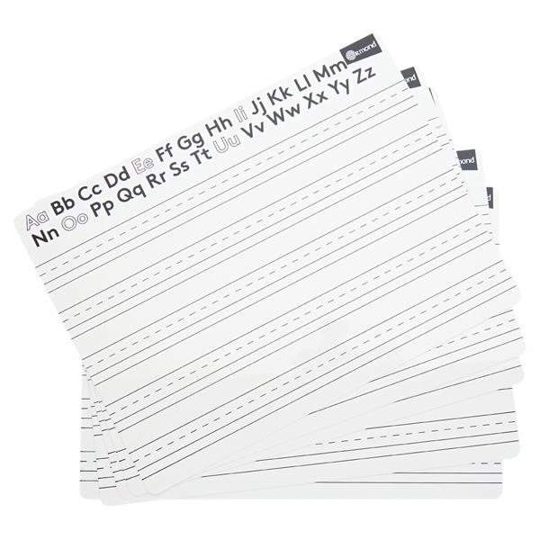 Stack of white dry-erase boards with ruled handwriting lines and black alphabet letters printed at the top.