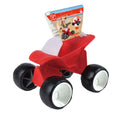 Red plastic toy buggy with chunky black tires, white rims, and a cardboard tag showing a child playing in sand.