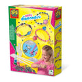 SES Creative Easy diamonds box showing colorful beaded bracelets, silver charms, and a smiling girl wearing them.