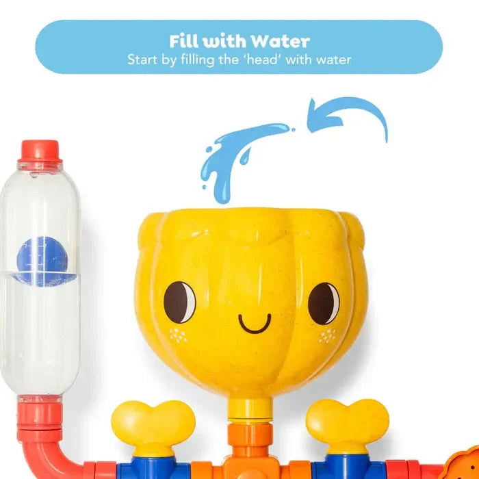 Water pours into a smiling yellow character head next to a clear water level gauge on a colorful pipeline toy.