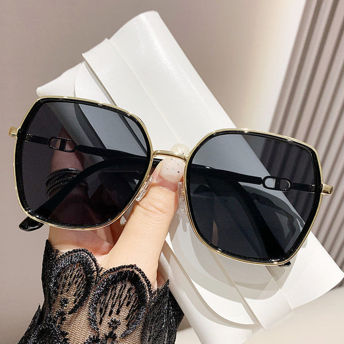 ECOTREK oversized fashion sunglasses for women with polarised UV protection, stylish shades with dark tinted lenses.