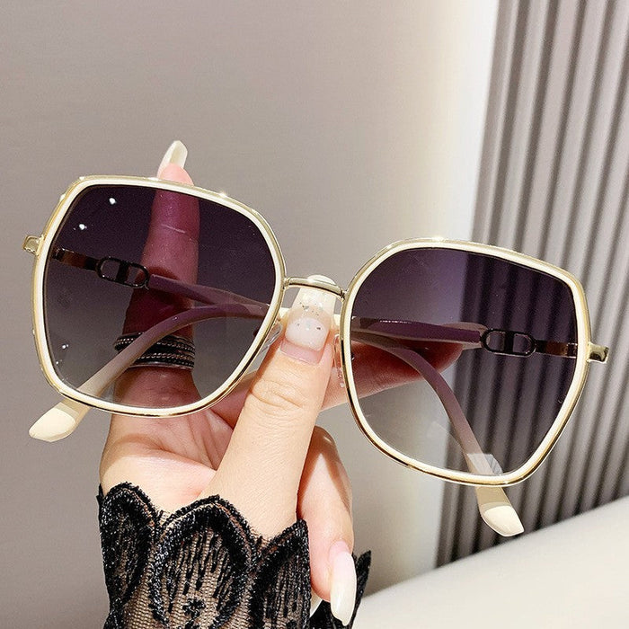 ECOTREK oversized fashion sunglasses for women with polarized lenses and UV protection, stylish shades in black.