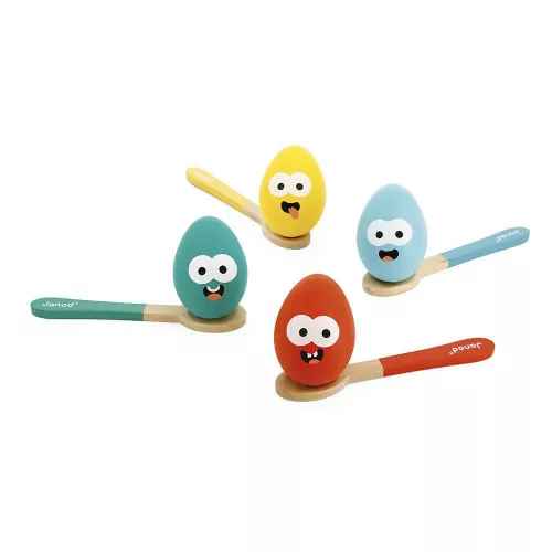 Four colorful wooden eggs with silly faces resting on matching spoons: yellow, teal, light blue, and red.