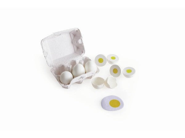 Wooden toy egg set with white eggs, halved eggs with yellow yolks, shells, and a felt fried egg in a grey carton.