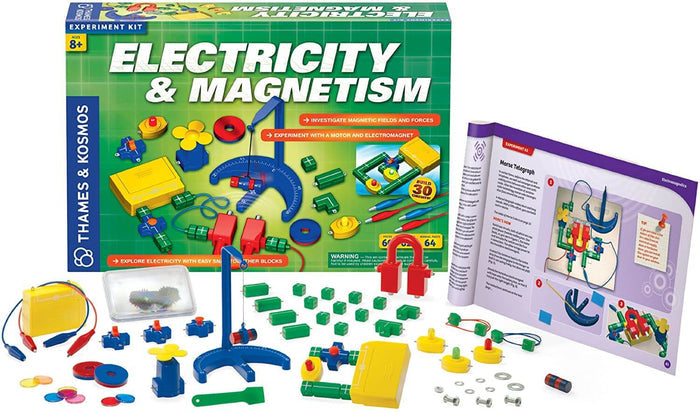Teal science kit box and manual with colorful snap-together circuit blocks, magnets, and wires on a white background.